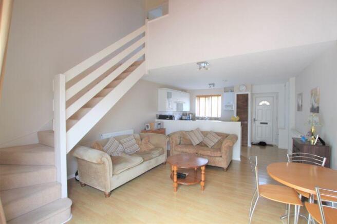 open plan lounge/dining/kitchen