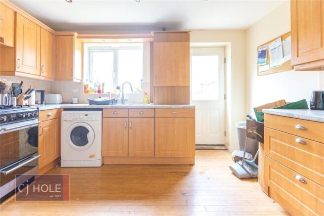 Bright and inviting kitchen with ample natural ...
