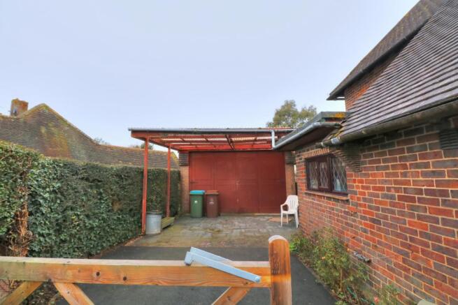 Driveway with Double Height Garage and Car Port