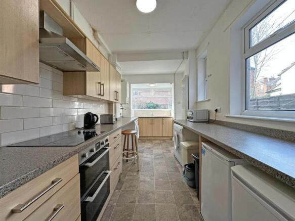 Bright modern kitchen with extensive counter sp...