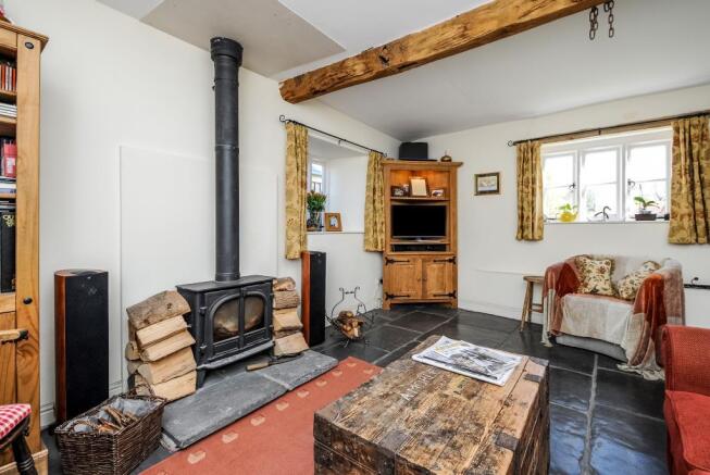 Cosy stting room with wood burning stove