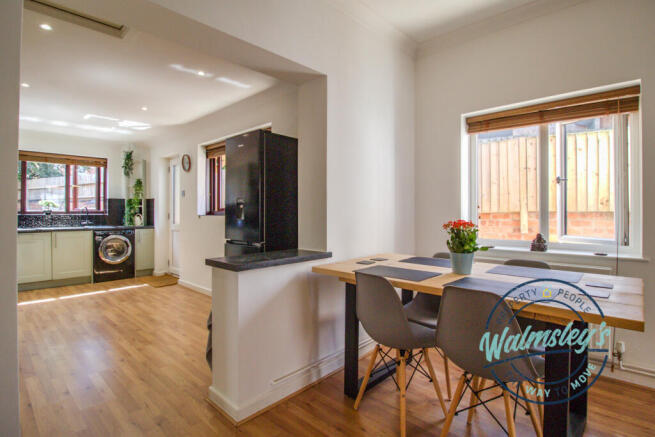 Kitchen dining & plentiful windows & light