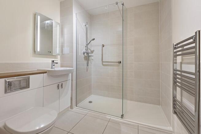 a bathroom with a glass shower