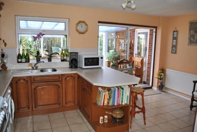 KITCHEN SHOWING DINING AREA