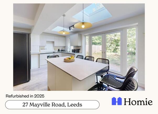 Bright and modern kitchen with large windows pr...