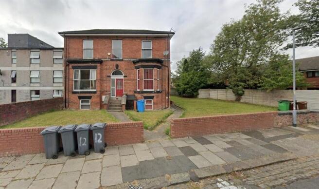 Brick-front semi-detached house with a small fr...