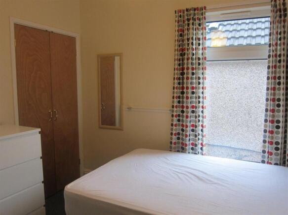 Bright bedroom with storage and ample natural l...