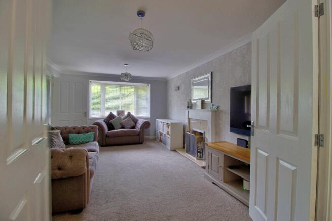 Double Doors open to Kitchen for entertaining