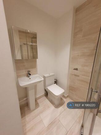 Stylish Bathroom - Shower, w/c & Washbasin