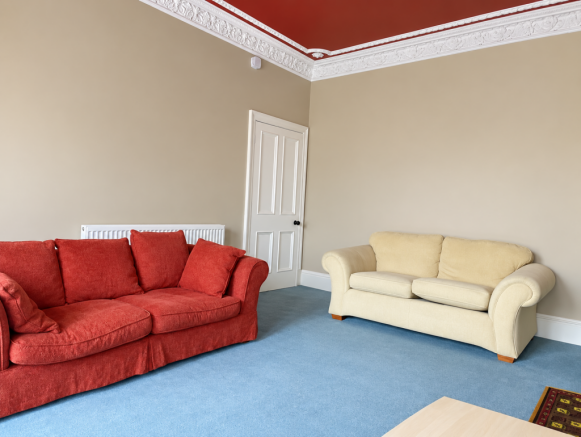 Classic Living Room with Ornate Ceiling Molding