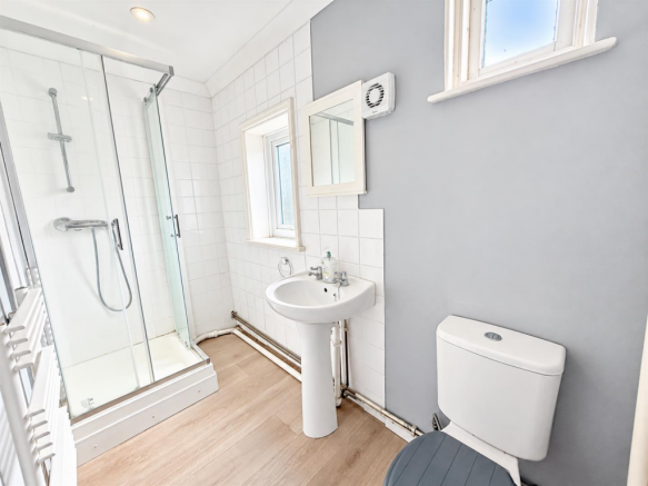 Bright Minimalist Bathroom Interior (1).png