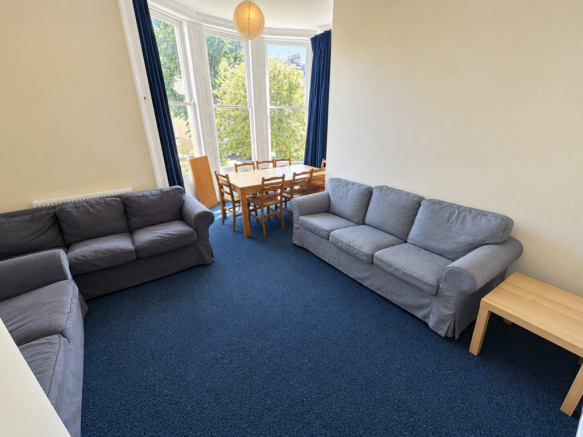 Refreshed Blue-Carpet Living Room