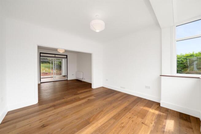 FRONT ROOM TO OPEN PLAN LIVING ROOM
