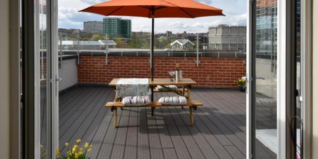 Stunning roof terrace with panoramic city views...