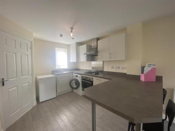 Kitchen and breakfast bar