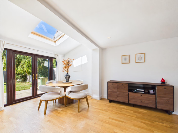 Tidied dining area with sideboard-1.png