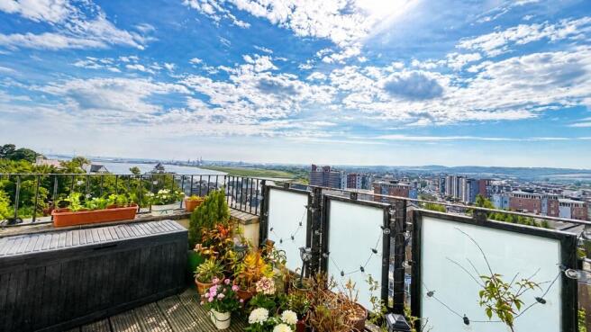 Sunny terrace with stunning scenic city views...