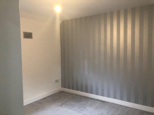 On the right of the washroom is bedroom2