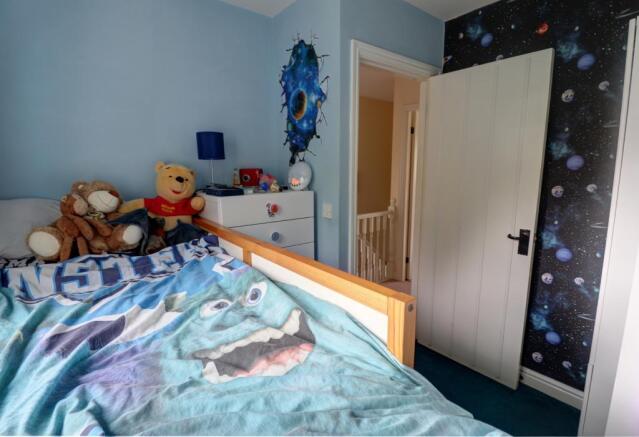 Bedroom four photo two