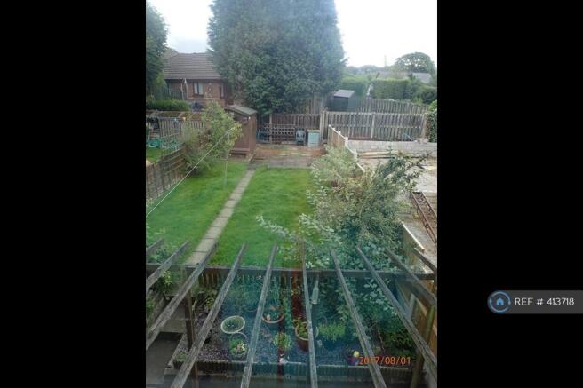 Garden With Lawn And Shed