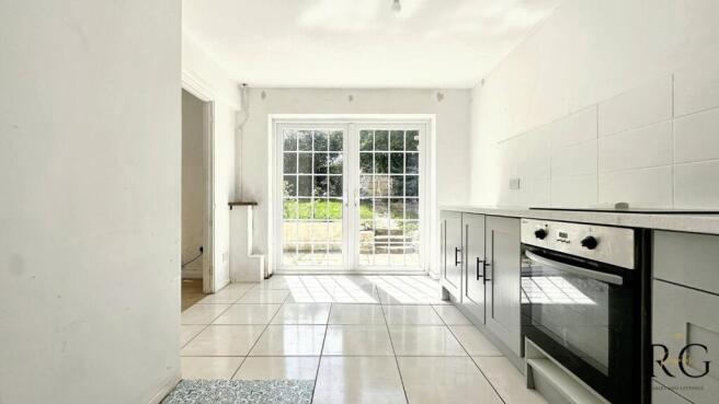 Bright, spacious kitchen with garden access...