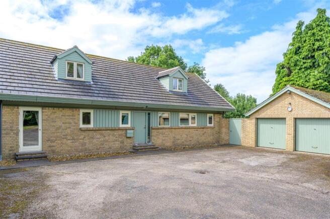Front Aspect & Double Garage