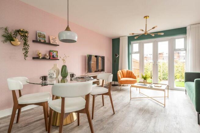 Double doors opening out to the rear garden