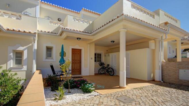 mid-row unit with carport