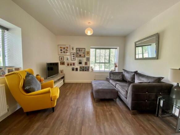OPEN PLAN LIVING AREA AND KITCHEN AREA