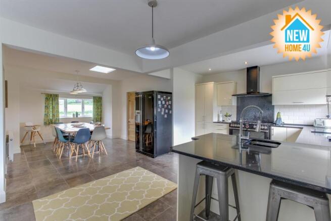 KITCHEN/DINING AREA/ FAMILY ROOM: