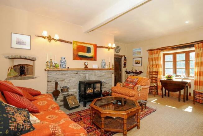 Cosy sitting room overlooking the front garden