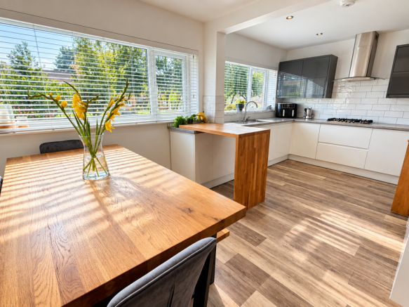 Sunlit Modern Kitchen Dining Room.png