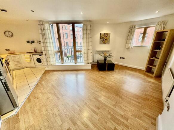 OPEN PLAN LIVING ROOM AND KITCHEN`
