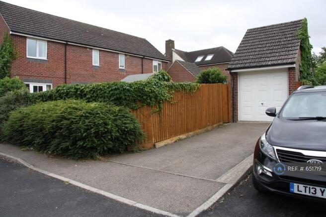 Garage And Rear House View