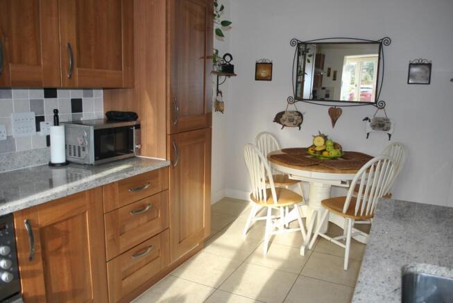 VIEW OF DINING AREA IN KITCHEN