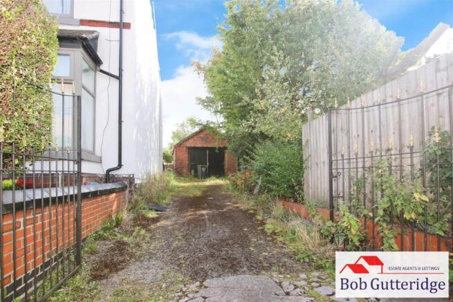 OFF ROAD PARKING & DETACHED BRICK GARAGE