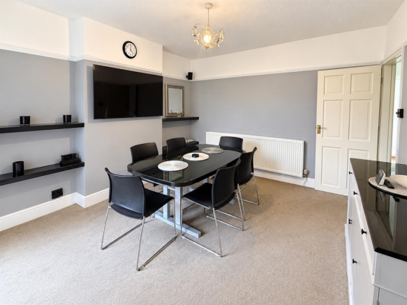 Modern Grey and Black Dining Room.png