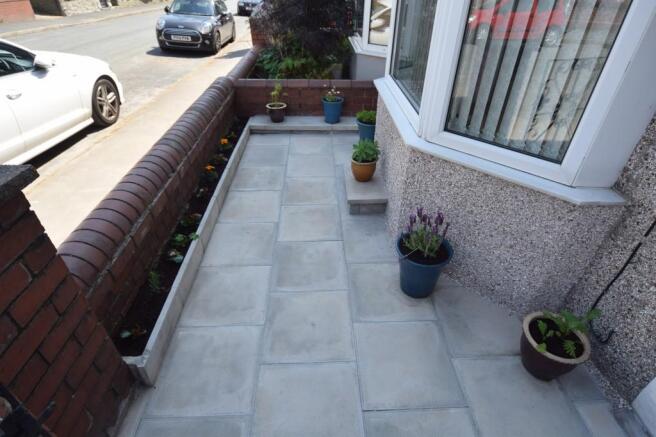 PAVED FORECOURT