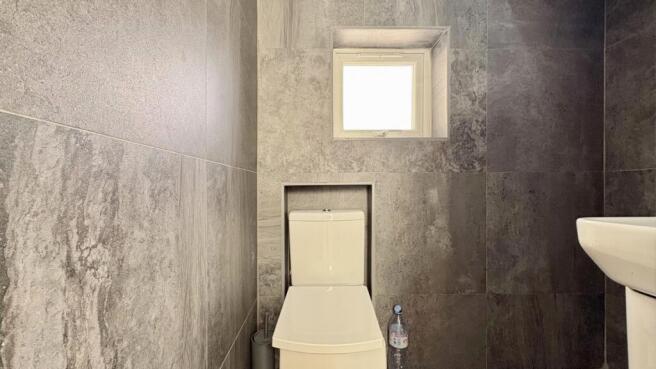 Modern tiled toilet with stylish finish...