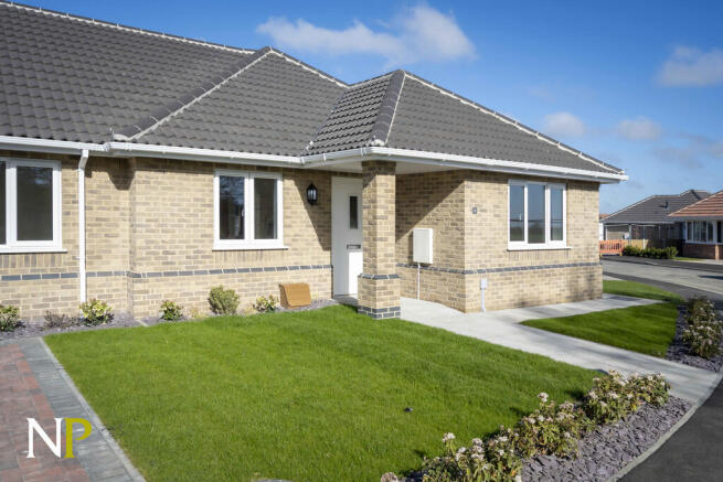 Photo shows Plot ...