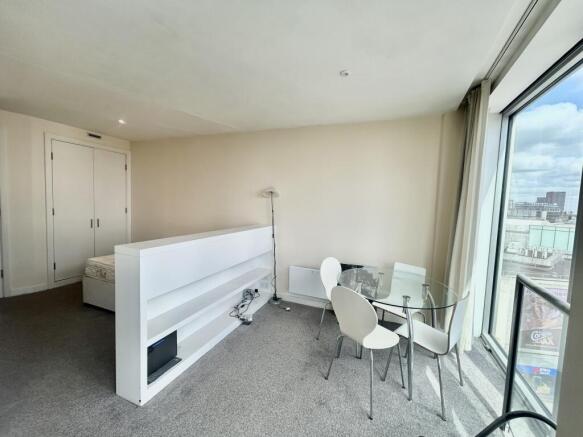open plan living room into bedroom beautiful views
