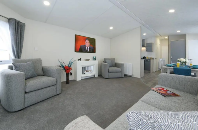 Bright Open Plan Lounge With Modern Grey Seating A