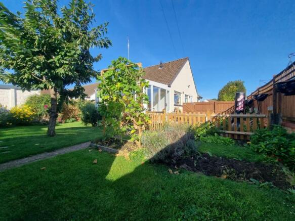 FRONT/SIDE GARDENS