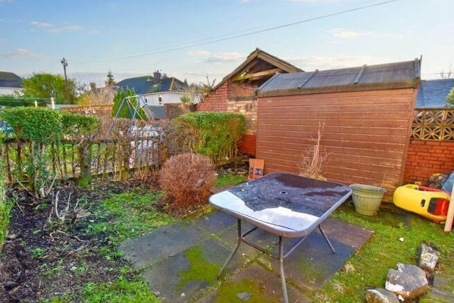Patio and Shed to the Rear