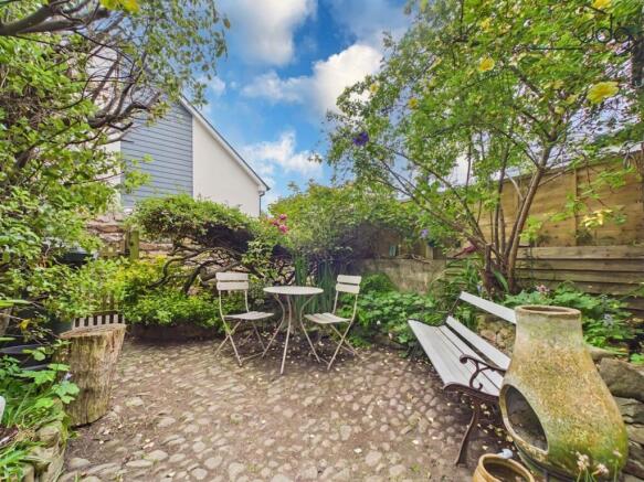 A private cobbled South facing garden