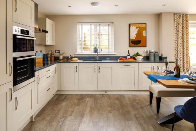 An open plan, modern kitchen is ready to go from the day you move in
