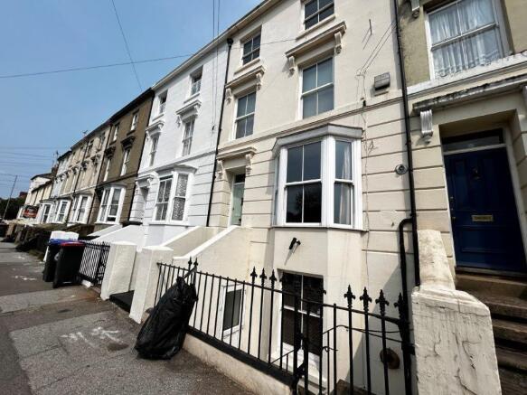 Stunning period townhouse on a sunny street...
