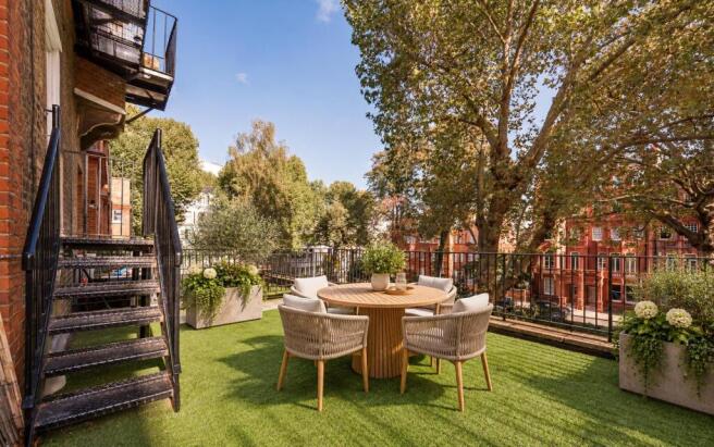 Sunny Urban Terrace Dining Retreat.jpg