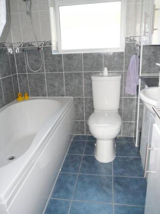 The fully-tiled Bathroom