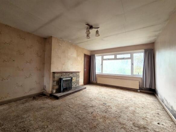 12 Milbourne Pk - Living Room.jpg